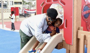 LaZón and Zhaiden Phillip come out to enjoy the new playground at Emile Griffith Ballpark.