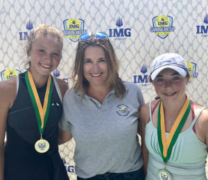 Jeanette Mireles (left) defeated Calissa Dellabarca (right) as the top girl player in the USVI Cup held last week on St. Croix. USVI Tennis Association President Kelly Kuipers presented the competitors with medals. (Submitted photo)