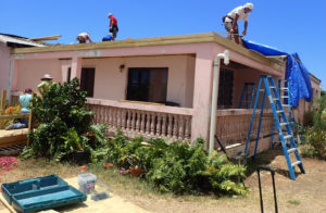 Lutheran Disaster Response volunteers work on Grimilda Quinones house in Frederiksted.