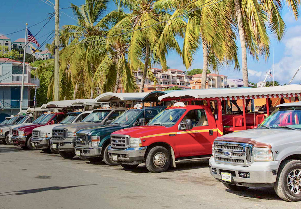 Taxis line up for business on St. John. (Photo from the V.I. Taxi Association website)