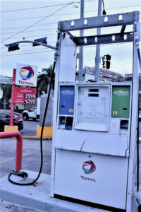 A service pump at a Total gas station on Veterans Drive is plastered with a sign indicating it is out of service. If the pump did work, the cost would be almost $4 a gallon. (Bethaney Lee photo)