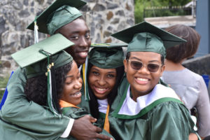 The four graduates from St. Croix Seventh-day Adventist School Class of 2019 share a hug. From left, Mahlana Graham, Shomari Francis, Stacy Frederick, Chanel Aubert.