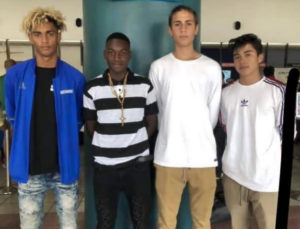 The four V.I. teens pause at the Cyril E. King Airport Monday before heading for Spain, from left, From left to right Elton Richards, Jimson St.-Louis, Connor Querrard, and Dalton Parr. (Source photo by Kyle Murphy)