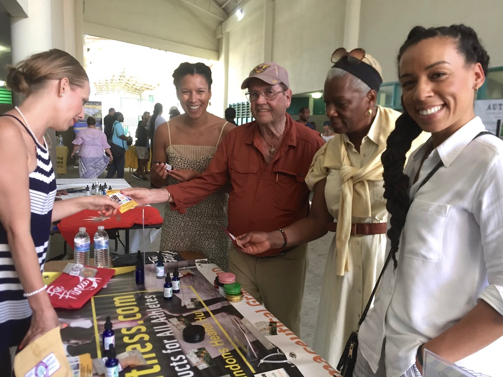 From left,speaker and vendor Sierra Riddle chats with Dr. Rachel Knox, Holland Redfield, Dr. Janice Knox and Dr. Jessica Knox at the Cannaval. (Source photo by Susan Ellis)