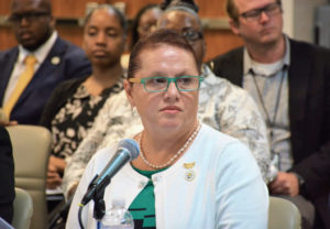 Director of Health Justa Encarnacion takes questions from the Senate Finance Committee. (Photo by Barry Leerdam for the USVI Legislature)