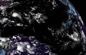 Satellite photo shows Dorian bearing down on the U.S. coast in the upper left quadrant while a new tropical wave forms over the Cabo Verde Islands in the lower right quadrant. (NOAA photo)