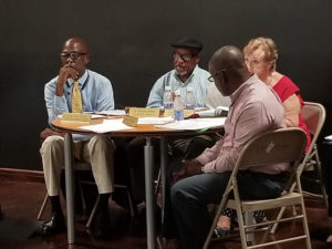 Coastal Zone Management commissioners listen to Coral World’s legal counsel George Dudley, from left, Keith Richards, Winston Adams, Sarah Simmonds, and Karl Percell. (Source photo by Bethaney Lee)