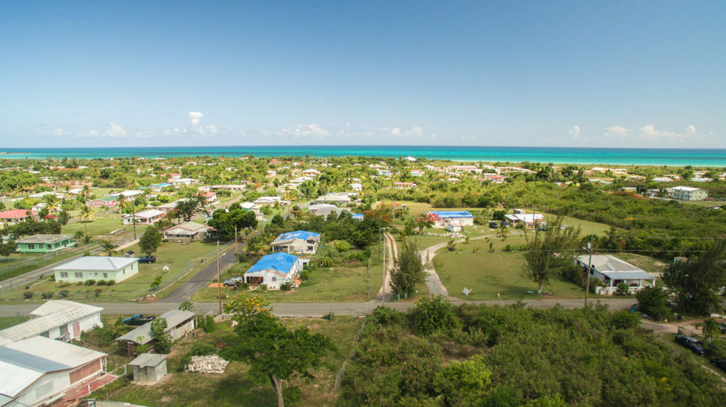 Aerial photo by Daryl Wade shows a sprinkling of fading tarp roofs in Estate Whim two years after the passage of Hurricane Maria. (Daryl Wade photo)