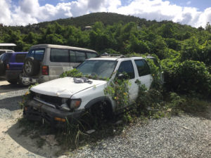 Abandoned cars such as this were removed from the lot last summer. (Source file photo by Amy Roberts)