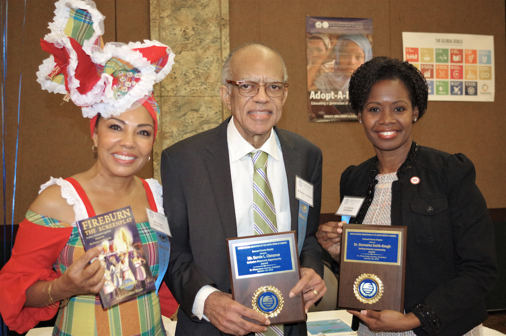 Golden Bryan, Clenance, and Smith Baugh - From left, Virgin Islanders Angela Golden Bryan, Kervin Clenance, and Germaine Smith-Baugh pose for a photo after participating in a United Nations Association of Broward County luncheon Sunday. (Photo by Colleen Brown)