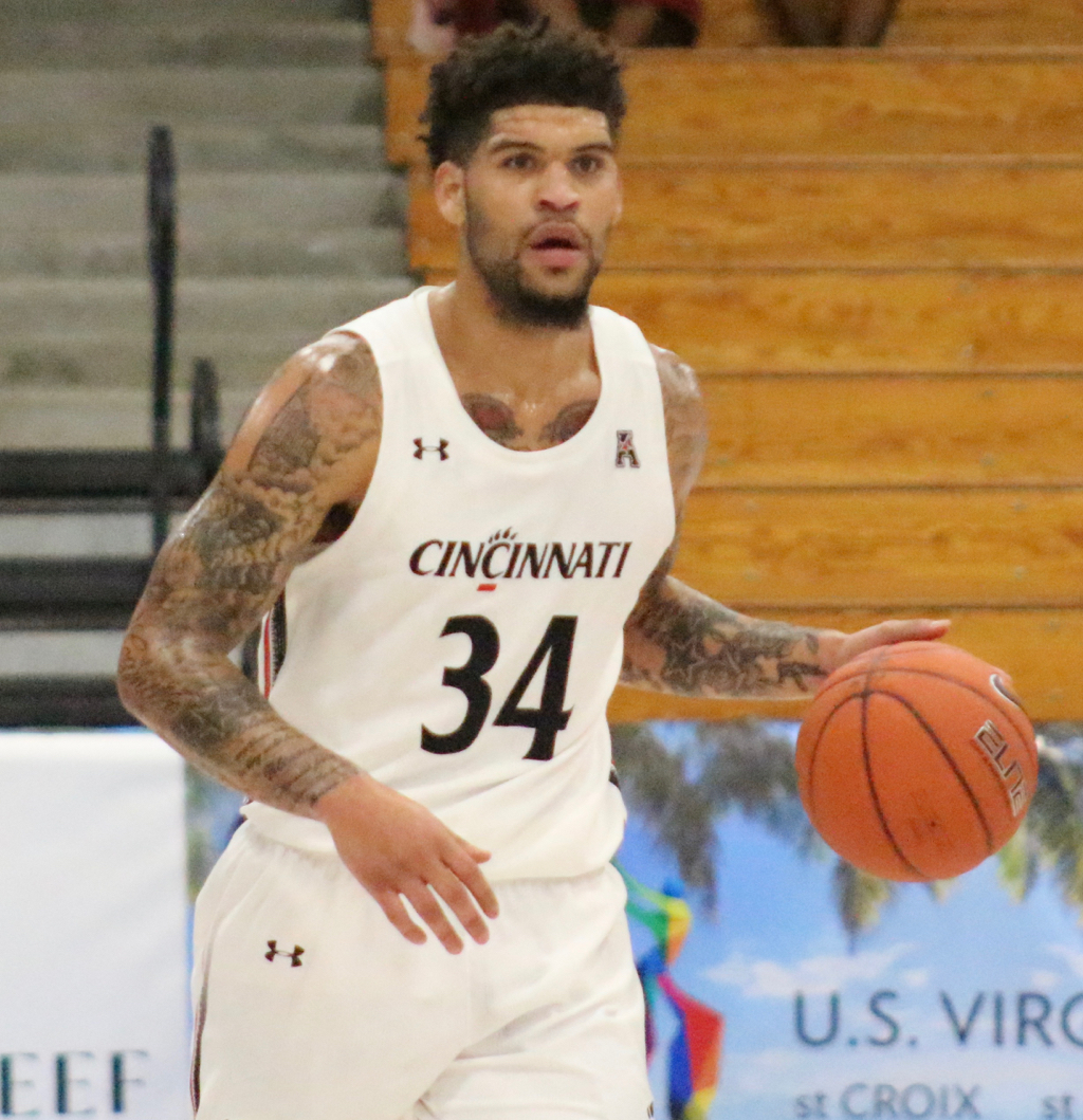 Jarron Cumberland drives the ball up court in Cincinnati’s thrilling victory. (Photo by Basketball Travelers)