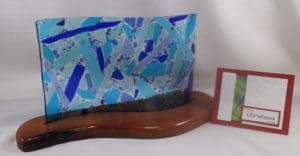 Laura Marie Forbes "Picking up the Pieces" glass piece and Madras Christmas card. (Submitted photo)