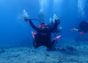 Courtney Robenelt leads scuba divers at Wreck Cove, Buck Island. (Source photo by Dave MacVean)