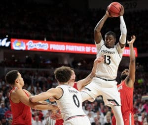 Tre Scott sweeps the glass clean for the University of Cincinnati Bearcats, averaging 10.3 rebounds a game. (Photo from the University of Cincinnati Athletic Department)