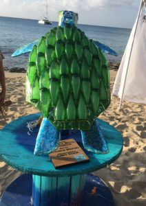 The back of Marilyn Hodges’s turtle is partly decorated with half-bottles. (Source photo by Susan Ellis)