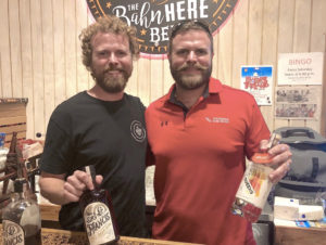 Brothers John and Joe Brugos of Virgin Islands Craft Distillers showcased locally made spirits, including their Sir Francis Rum and 3 Queens gin, at a recent tasting in Havensight. (Source photo by Teddi Davis)