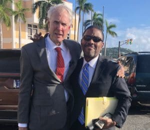 Defense attorney Gordon Rhea, left, and defendant Amos Carty outside the courthouse on St. Thomas Friday. (Source photo by Judi Shimel)