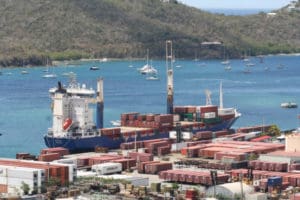 Cargo ship unloads containers. (Photo from Crowley Maritime website)