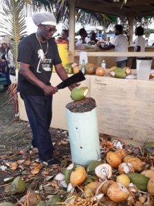 Percival Tahema Edwards puts on a display cutting a mound of coconuts at the fourth annual Crucian Coconut Festival. (Source photo by Darshania Domingo)