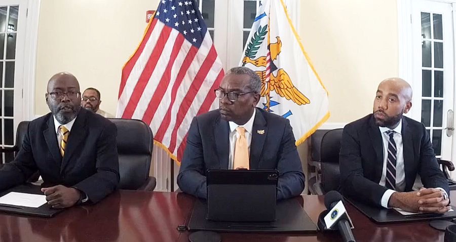 From left, VIPD Commissioner Trevor Velinor, Gov. Albert Bryan Jr. and Government House spokesman Richard Motta field questions about ongoing safety initiatives. (Source photo by James Gardner)