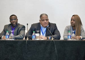 From left, Division of Festivals Director Ian Turnbull, Commissioner of Tourism Joseph Boschulte and Alani Henneman-Todman, the Department of Tourism's director of communications, present the new St. Croix motto in the Bahamas. (Photo submitted by the Department of Tourism)