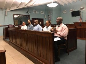 Panelists at Wednesday’s meeting on St. John, from left, DLCA Commissioner Richard Evangelista, Hemo board member Laurent “Tippy” Alfred, DLCA Director of Consumer Affairs Miguel Tricoche, DLCA’s Assistant Director of Environmental Health Juanita Johannes, and Director of the Division of Licensing Horace Graham. (Source photo by Amy Roberts)