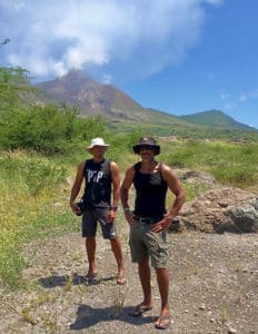 1. Patrick, left, and Steve Bennett stand beneath the Soufrière Hills Volcano in Montserrat.