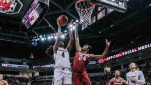 Alyah Boston, No. 4 in white, puts up a shot against Arkansas.