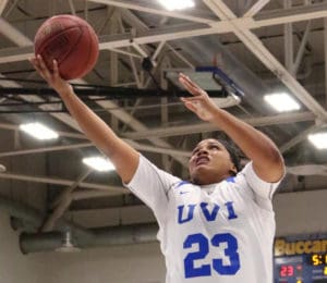 Rhea Benjamin makes a lay-up during the women’s victory over Carver College. (Source photo by Kyle Murphy)