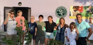 Allegra Miles, fifth from left, attends a family gathering to honor the memory of her grandfather, Peter Muilenburg, in December 2019. (Source photo by Amy H. Roberts)