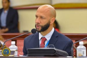 Schneider Regional Medical Center Chief Executive Officer Luis Amaro testifies before the Health, Hospitals, and Human Services Committee. (Photo by Chaunte Herbert)