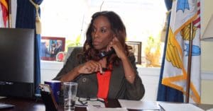 Delegate Stacey Plaskett (D-VI) on the phone in her Washington D.C. office speaking with reporters in March 2020. (File photo provided by Delegate Stacey Plaskett's office)