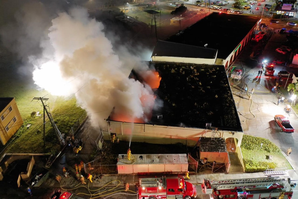 An aerial photo captures the scene as firefighters battle the blaze that has burned through the roof. (Photo provided by V.I. Fire Services Director Daryl. A. George Sr.)
