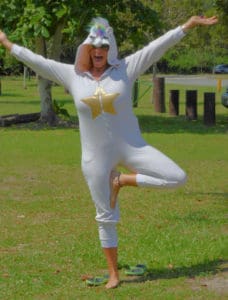 Danielle Marie, dressed as a unicorn, is one of the instructors for Breathe Yoga for Kids. (Source photo by Shaun Pennington)