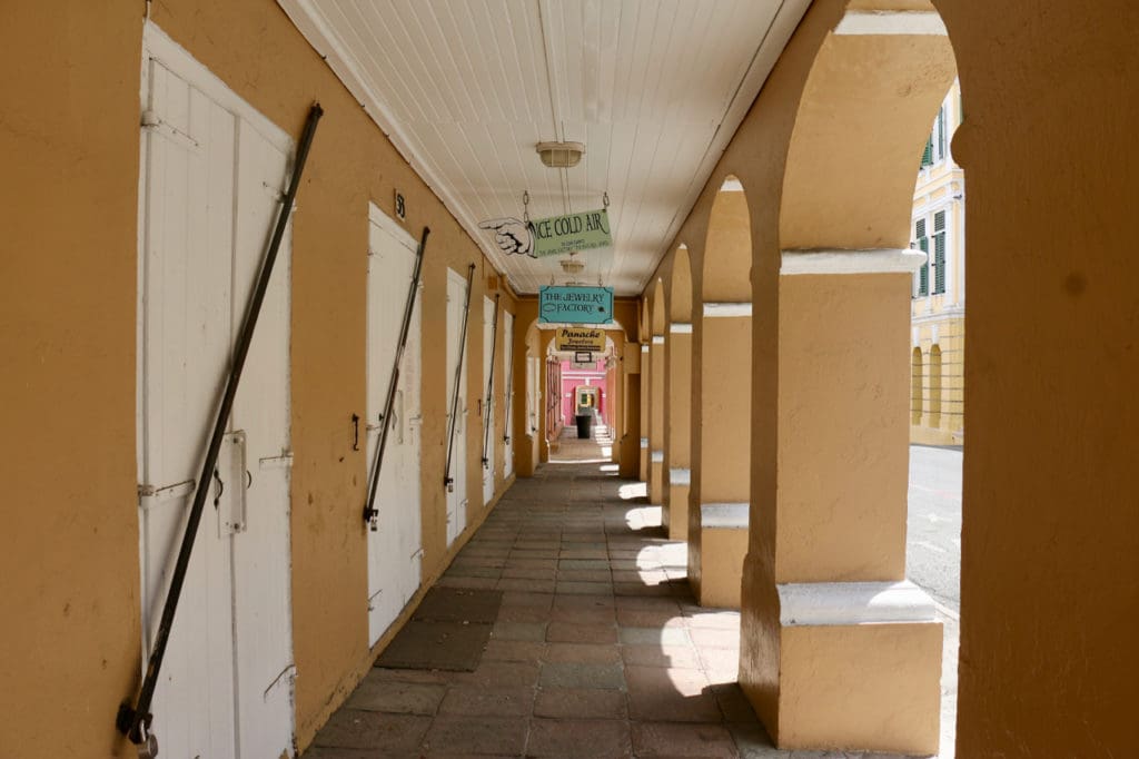 All businesses along the arched walkways on King Street are locked. Only a single trash can was visible. (Source photo by Linda Morland)