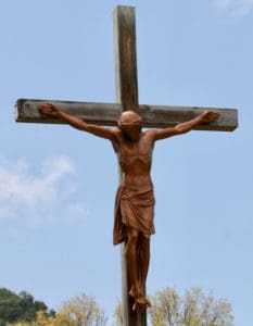 Beside St. John’s Episcopal Church is a representation of what Easter is about. (Source photo by Linda Morland)