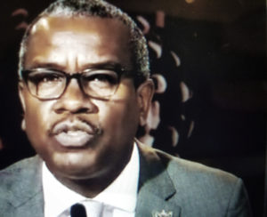 Gov. Albert Bryan Jr. announces the territory’s phased reopening plan. (Photo is a screen capture from the press conference)