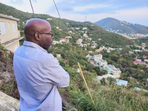 Police Commissioner Trevor Velinor looks down over the Hospital Ground neighborhood Saturday. (VIPD photo)