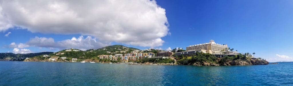 A bustling Marriott’s Frenchman’s Cove is on the left, while Frenchman’s Reef, on the right, is unopened and awaiting major repairs that have been delayed by the coronavirus. (Source photo by Bethaney Lee)