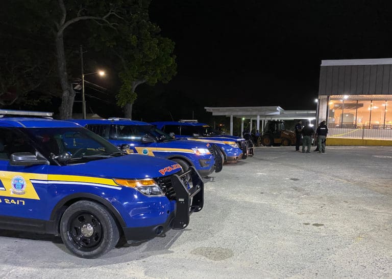 Police officers at United Shopping Plaza, where a shooting incident left one man injured. (VIPD photo)