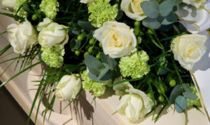 flower funeral coffin shutterstock