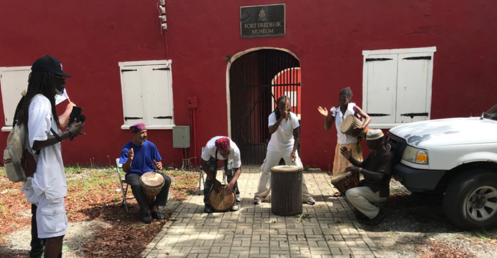 Emancipation Day Drummers play in front of Fort Frederik at the end of the Walk to Freedom. (Source photo by Elisa McKay)