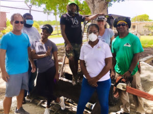 The ib design team after a day of volunteering at Lew Muckle Elementary School, from left, Todd Manley, Erick Willie, Sheba Fabien, Whealan Massicott, Resa O’Reilly, Kris Massicott and Ferdi Abraham. (Submitted photo)