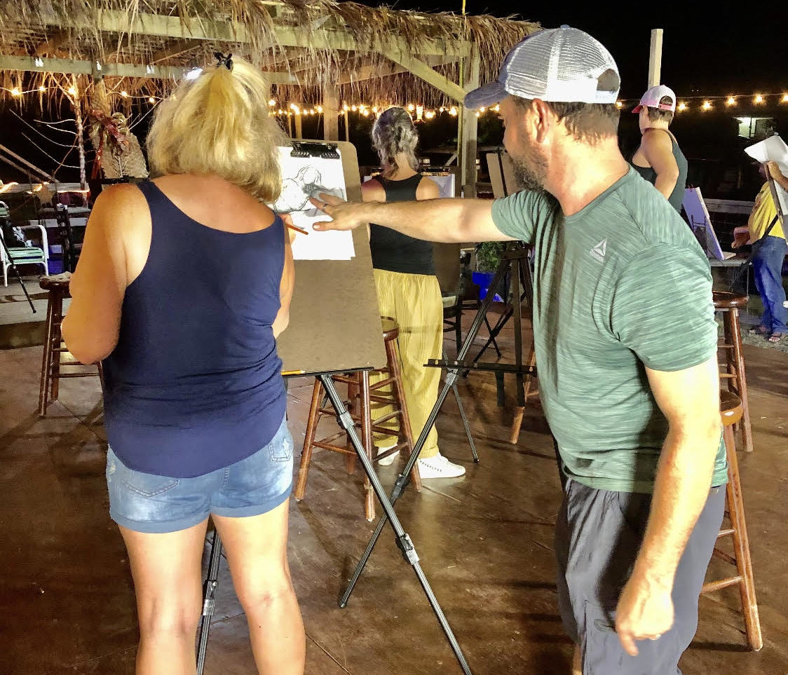Artist Bryan McKinney, right, will lead two figure drawing sketch classes this evening at the Caribbean Coral Bay Oasis on St. John. (Submitted photo)