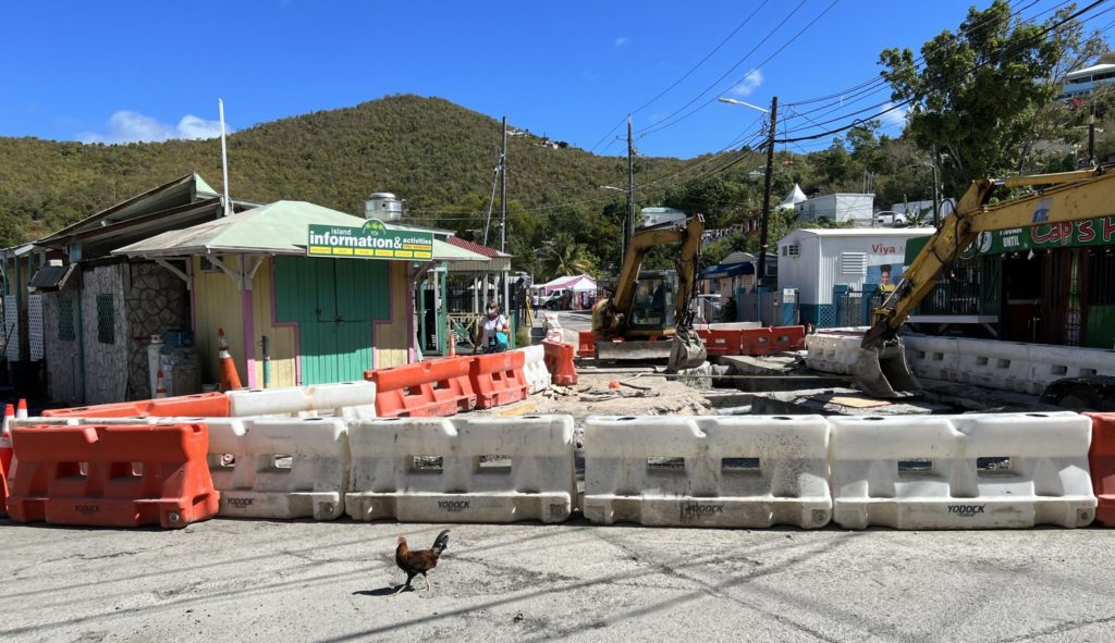 Only chickens are getting through on the road in front of the post office. (Source photo by Amy H. Roberts)