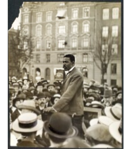 David Hamilton Jackson, a teacher, owner and editor of a newspaper, and a judge from St.  Croix who fought for workers' rights, is pictured in 1915 giving a speech in Denmark.  The photo is another example of a primary source used by researchers to understand history.  (Image from the Danish Royal Library)