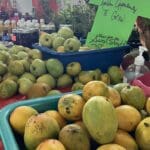 Local mangos and other locally grown food at the farmer exhbit at the 50th AgFair in S. Croix are ripe for the eating.