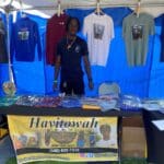 Young Entrepreneur, Molloy, at his booth, Hawitowah, at the 50th AgriFest in St. Croix
