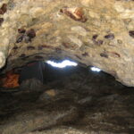 hiker in cave