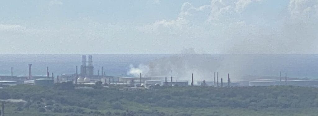 Smoke billows from Port Hamilton Refining and Transportation Sunday after a fire broke out in a Coker unit. (Photo by Russel Pate)